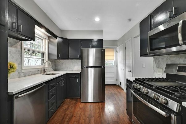 Interior, Kitchen, Recessed Lighting, Stainless Steel Appliances, Wood Texture Flooring