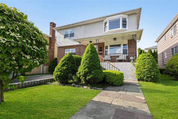 Exterior, Facade, Brick Facade, American Foursquare