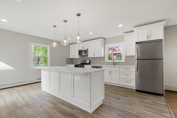 Interior, Kitchen, Pendant Lights, Recessed Lighting, Stainless Steel Appliances, Wood Texture Flooring