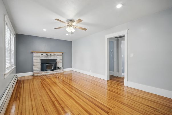 Empty room, Fireplace, Interior, Recessed Lighting, Wood Texture Flooring