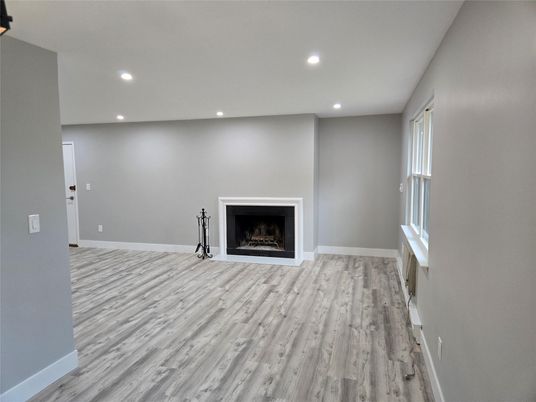 Empty room, Fireplace, Interior, Recessed Lighting, Wood Texture Flooring