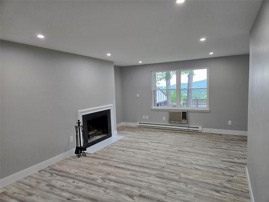 Empty room, Fireplace, Interior, Recessed Lighting, Wood Texture Flooring
