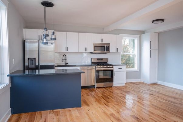 Interior, Kitchen, Pendant Lights, Recessed Lighting, Stainless Steel Appliances, Wood Texture Flooring