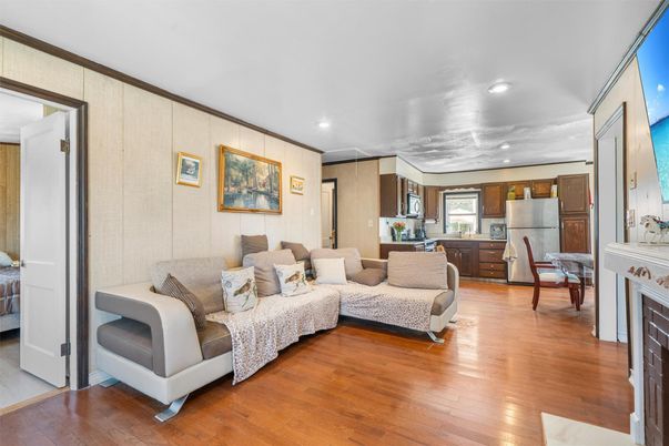 Dining room, Fireplace, Interior, Kitchen, Living room, Recessed Lighting, Wood Texture Flooring