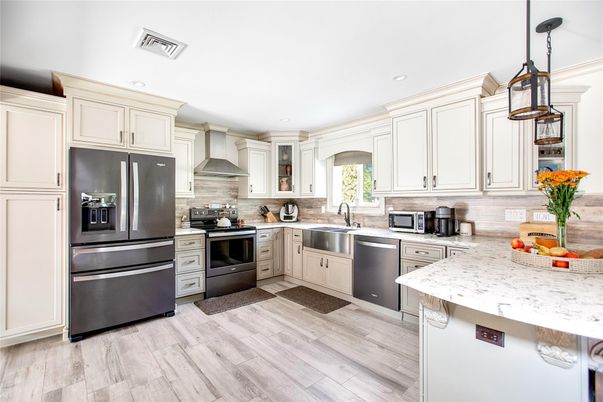 Interior, Kitchen, Pendant Lights, Recessed Lighting, Stainless Steel Appliances, Wood Texture Flooring