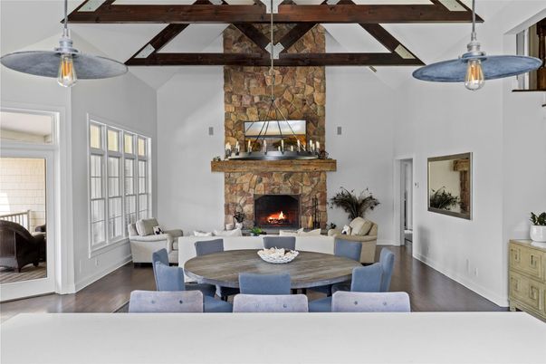 Dining room, Fireplace, Interior, Living room, Pendant Lights, Stone Walls, Wooden Beams, Wood Texture Flooring