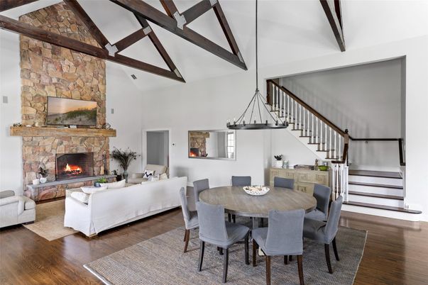 Dining room, Fireplace, Interior, Living room, Pendant Lights, Stone Walls, Wooden Beams, Wood Texture Flooring
