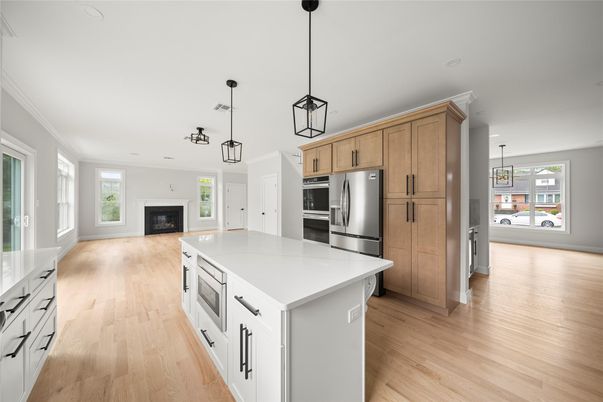 Fireplace, Interior, Kitchen, Pendant Lights, Recessed Lighting, Stainless Steel Appliances, Wood Texture Flooring