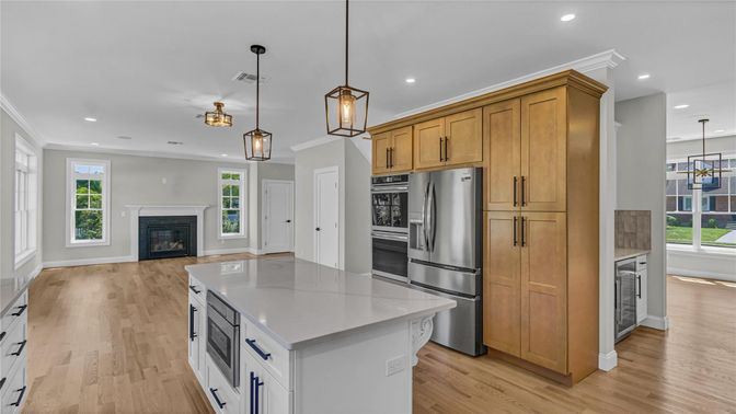 Fireplace, Interior, Kitchen, Pendant Lights, Recessed Lighting, Stainless Steel Appliances, Wood Texture Flooring