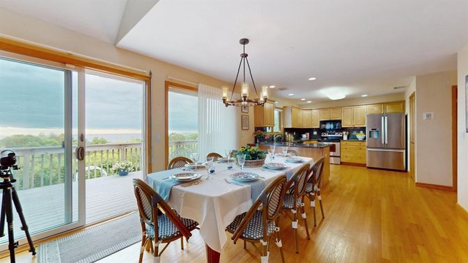Dining room, Interior, Kitchen, Pendant Lights, Recessed Lighting, Stainless Steel Appliances, Water, Wood Texture Flooring