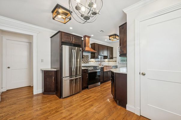 Interior, Kitchen, Pendant Lights, Recessed Lighting, Stainless Steel Appliances, Wood Texture Flooring