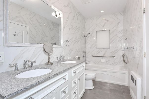 Bathroom, Dual Sink Vanities, Interior, Marble Walls, Recessed Lighting
