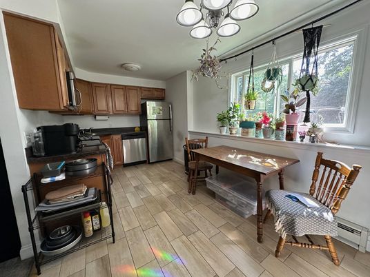 Chandelier, Dining room, Interior, Kitchen, Stainless Steel Appliances, Wood Texture Flooring