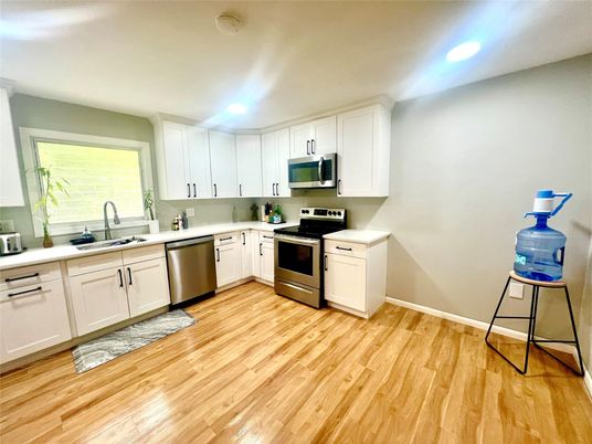 Interior, Kitchen, Recessed Lighting, Stainless Steel Appliances, Wood Texture Flooring