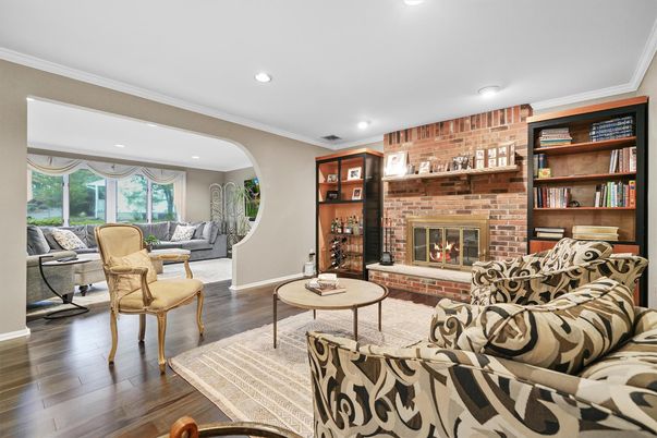 Fireplace, Interior, Living room, Recessed Lighting, Stone Walls, Wood Texture Flooring