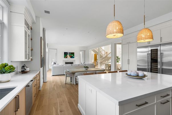 Fireplace, Interior, Kitchen, Living room, Pendant Lights, Recessed Lighting, Stainless Steel Appliances, Wood Texture Flooring