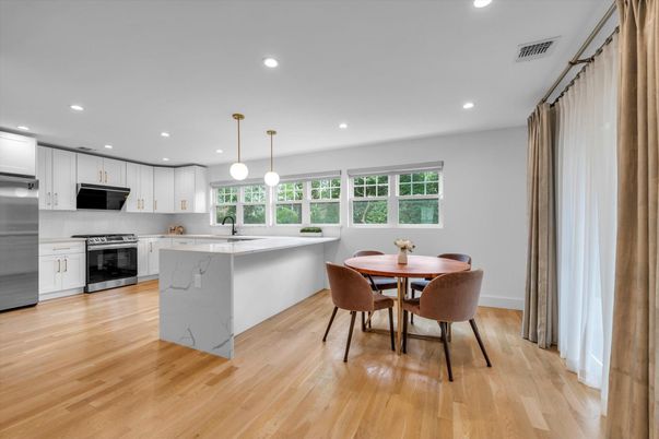 Dining room, Interior, Kitchen, Pendant Lights, Recessed Lighting, Stainless Steel Appliances, Wood Texture Flooring
