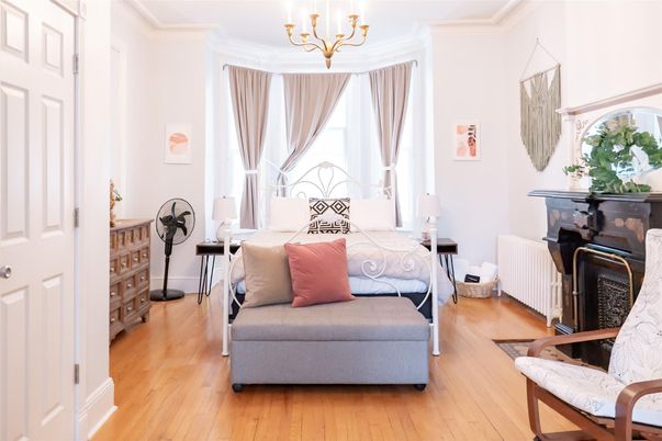 Bedroom, Chandelier, Fireplace, Interior, Wood Texture Flooring