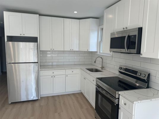 Interior, Kitchen, Recessed Lighting, Stainless Steel Appliances, Wood Texture Flooring
