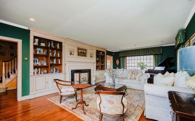 Fireplace, Interior, Living room, Piano, Recessed Lighting, Wood Texture Flooring