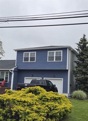 Attached, Exterior, Facade, Raised Ranch