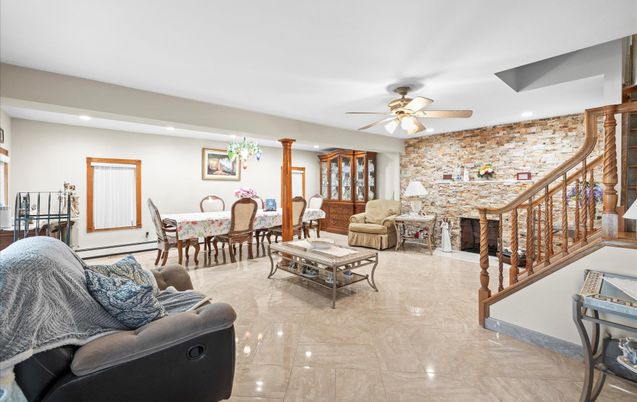 Dining room, Fireplace, Interior, Living room, Recessed Lighting, Stone Walls
