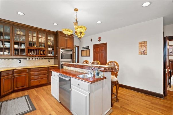 Chandelier, Interior, Kitchen, Recessed Lighting, Stainless Steel Appliances, Wood Texture Flooring