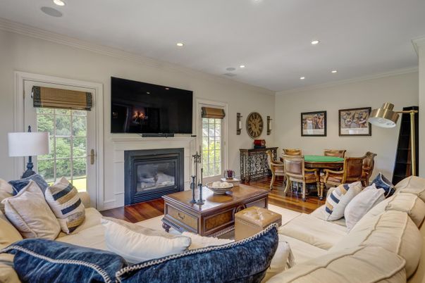 Dining room, Fireplace, Interior, Living room, Recessed Lighting, Wood Texture Flooring
