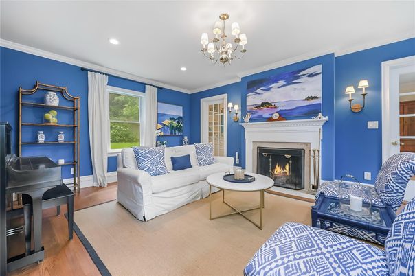 Chandelier, Fireplace, Interior, Living room, Piano, Recessed Lighting, Wood Texture Flooring