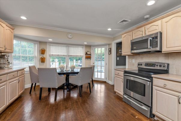 Dining room, Interior, Kitchen, Recessed Lighting, Stainless Steel Appliances, Wood Texture Flooring