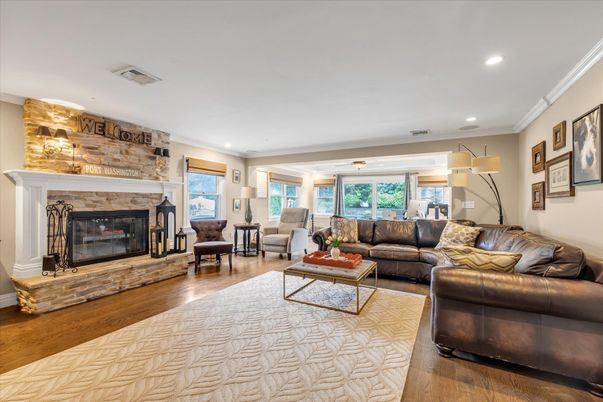 Fireplace, Interior, Living room, Recessed Lighting, Stone Walls, Wood Texture Flooring