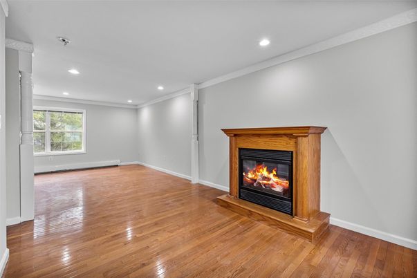 Empty room, Fireplace, Interior, Recessed Lighting, Wood Texture Flooring