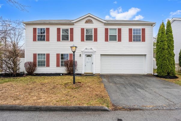 Attached, Exterior, Facade, Raised Ranch