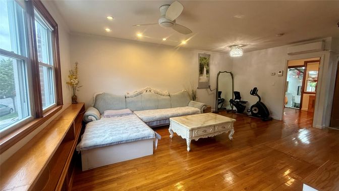 Bedroom, Chandelier, Fitness Equipment, Interior, Recessed Lighting, Wood Texture Flooring