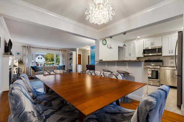 Chandelier, Dining room, Interior, Kitchen, Stainless Steel Appliances, Wood Texture Flooring