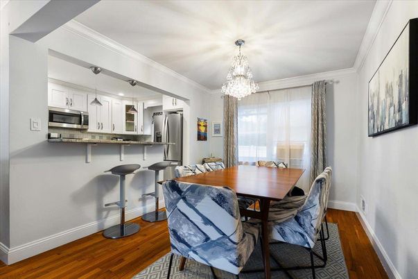 Chandelier, Dining room, Interior, Kitchen, Stainless Steel Appliances, Wood Texture Flooring