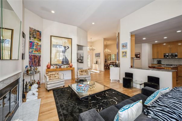 Chandelier, Fireplace, Interior, Kitchen, Living room, Recessed Lighting, Wood Texture Flooring
