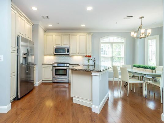 Chandelier, Dining room, Interior, Kitchen, Recessed Lighting, Stainless Steel Appliances, Wood Texture Flooring