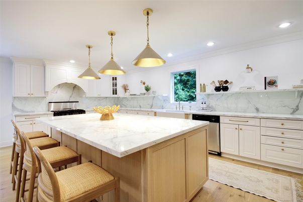Interior, Kitchen, Marble Walls, Pendant Lights, Recessed Lighting, Stainless Steel Appliances, Wood Texture Flooring