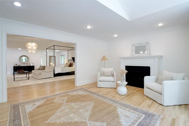 Bedroom, Chandelier, Fireplace, Interior, Living room, Recessed Lighting, Wood Texture Flooring