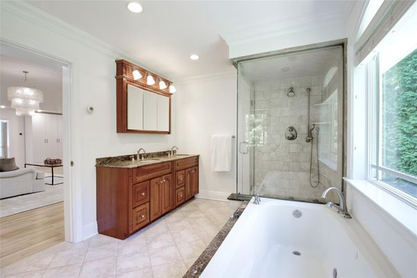 Bathroom, Dual Sink Vanities, Glass Shower, Interior, Recessed Lighting, Wood Texture Flooring