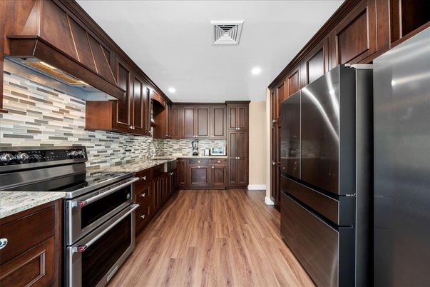 Interior, Kitchen, Recessed Lighting, Stainless Steel Appliances, Wood Texture Flooring