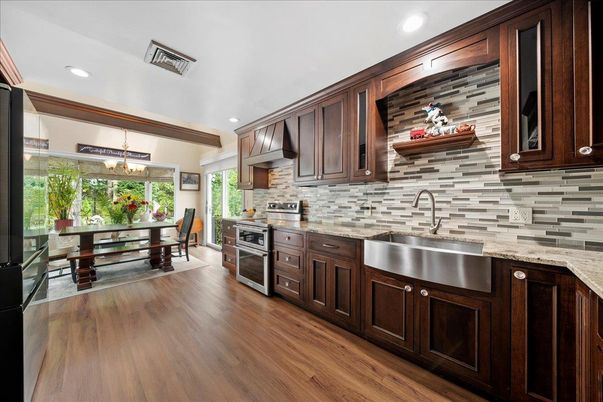 Dining room, Interior, Kitchen, Pendant Lights, Recessed Lighting, Stainless Steel Appliances, Wood Texture Flooring