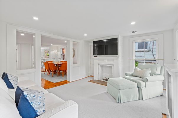 Dining room, Fireplace, Interior, Living room, Recessed Lighting, Wood Texture Flooring