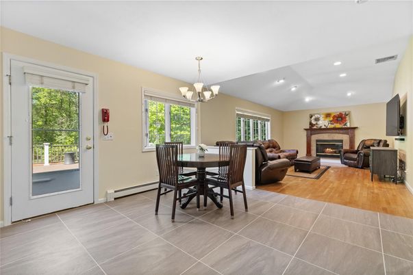 Chandelier, Dining room, Fireplace, Interior, Living room, Recessed Lighting, Wood Texture Flooring