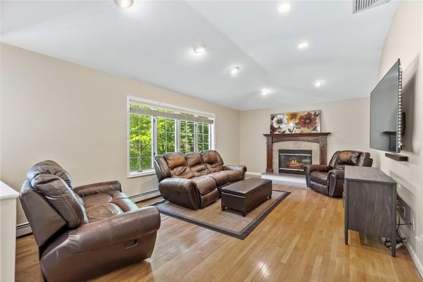 Fireplace, Interior, Living room, Recessed Lighting, Wood Texture Flooring