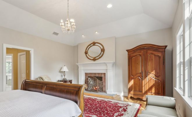 Bedroom, Chandelier, Fireplace, Interior, Recessed Lighting, Wood Texture Flooring