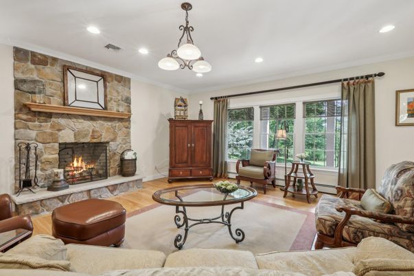 Fireplace, Interior, Living room, Pendant Lights, Recessed Lighting, Stone Walls, Wood Texture Flooring