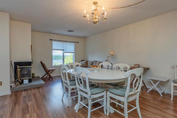 Chandelier, Dining room, Fireplace, Interior, Wood Texture Flooring