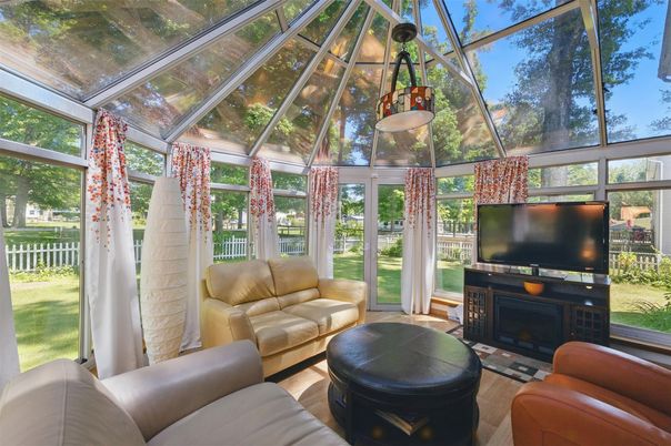 Fireplace, Glass Ceilings, Interior, Living room, Pendant Lights, Sun Room, Wood Texture Flooring